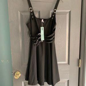 Black buckle dress